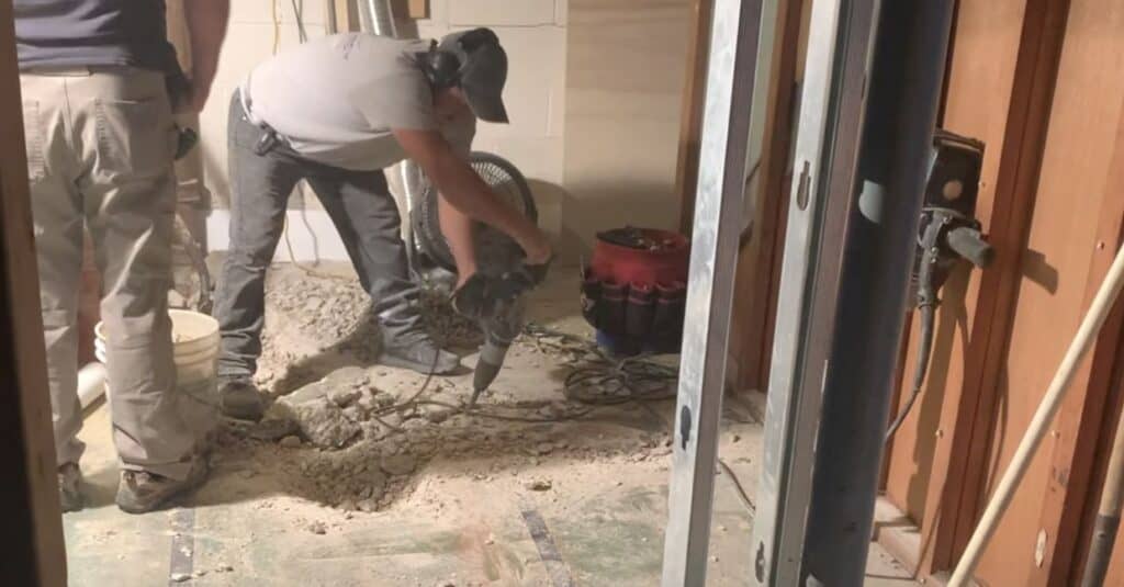 I paid a plumber $2,000 to perform the basement slab demolition and the under slab plumbing